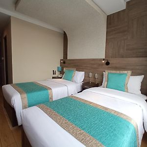 Zimmer mit zwei Einzelbetten